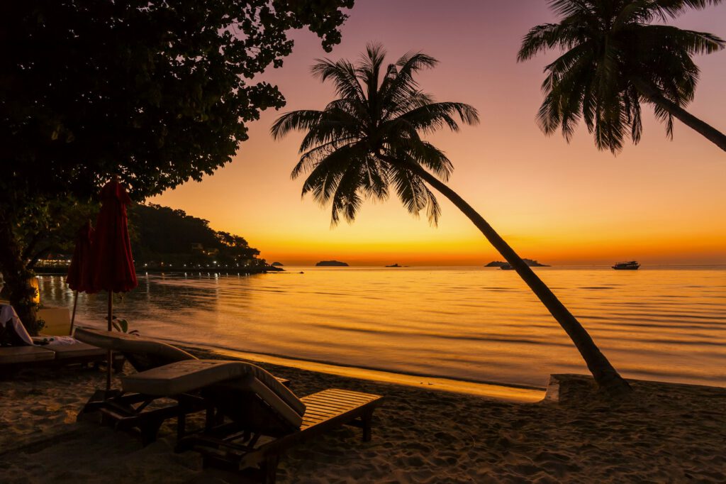 Beach chairs on the shore of a tropical island. Koh Chang. Thail